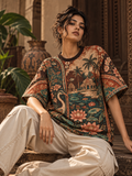Pattachitra Paradise women's oversized t-shirt with tropical Indian resort design by ZERO CODE