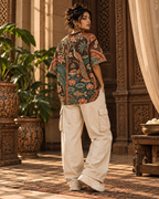 Pattachitra Paradise women's oversized t-shirt with tropical Indian resort design by ZERO CODE - view 4