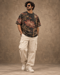 Burnt Lotus Ritual men's oversized t-shirt with tropical Indian resort design by ZERO CODE